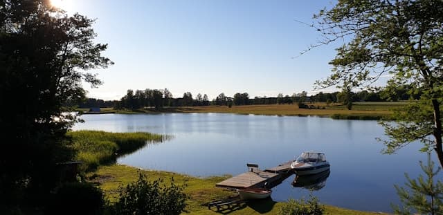 Brown wooden boat on river during daytime