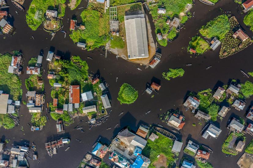 Birds eye view of houses on a river