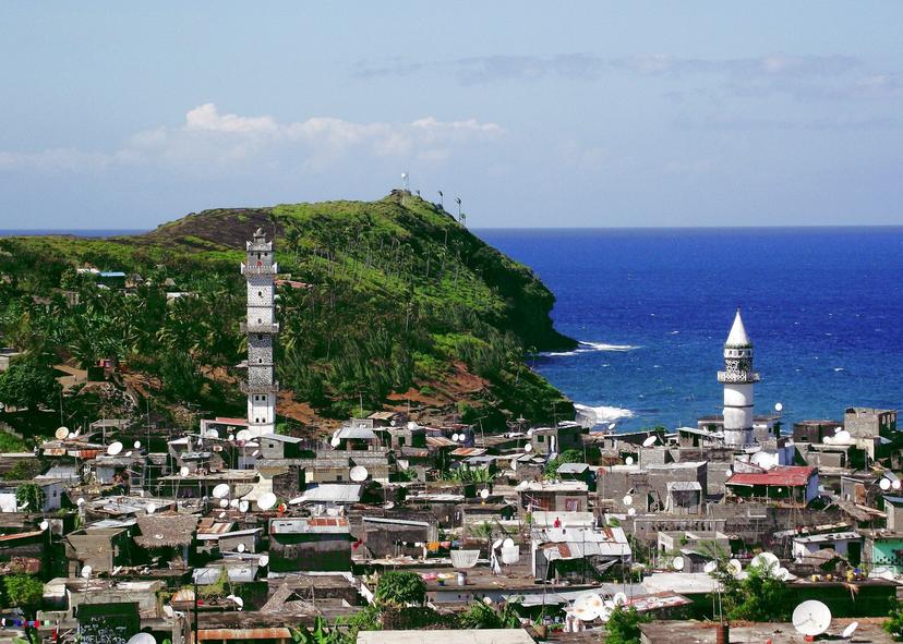 A village on an island next to the ocean.