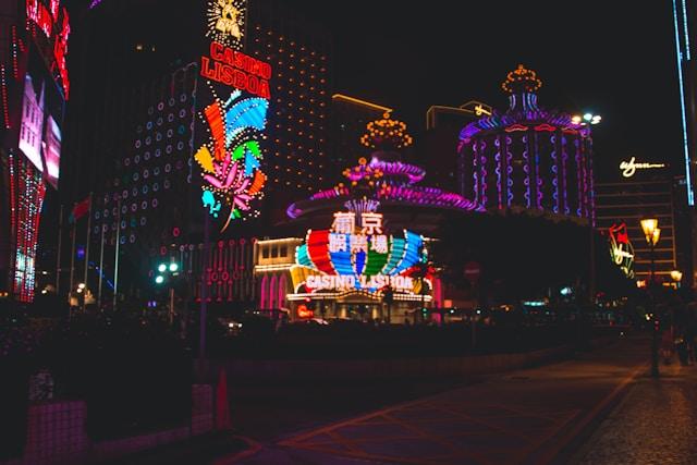 Purple and red lit casino building at night