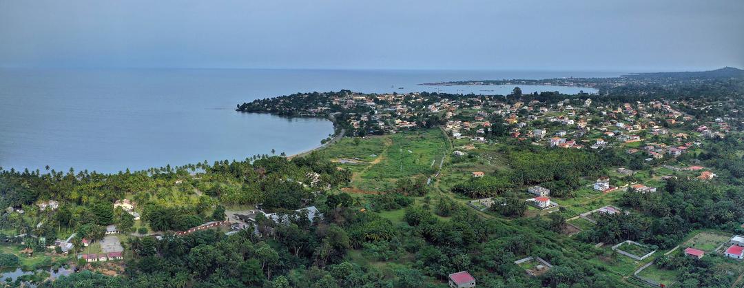 Aerial view of housing next to the sea