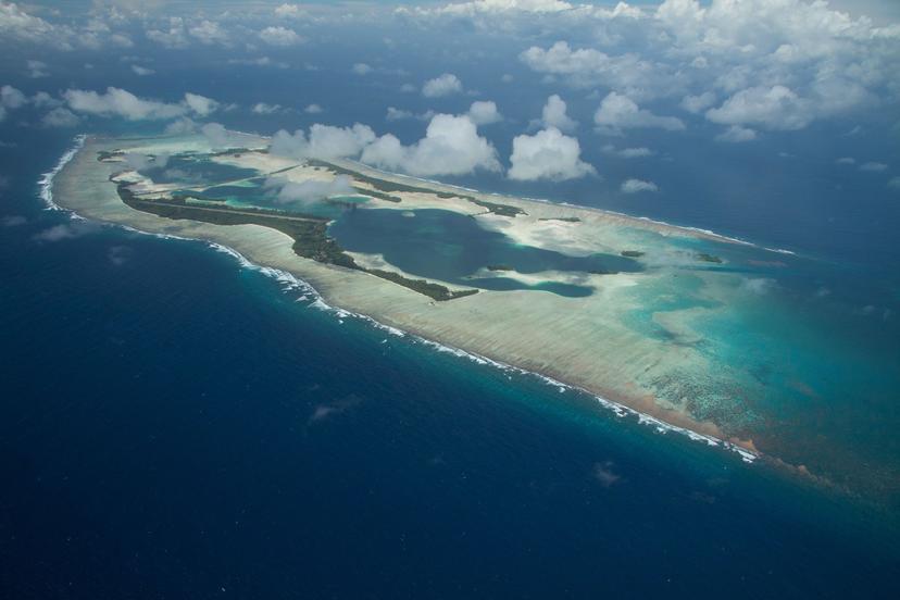 An aerial view of a small island, Palmyra Atoll.