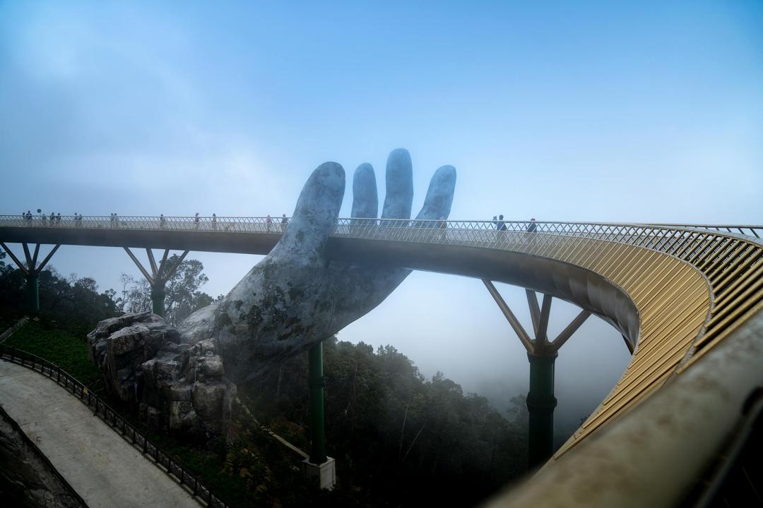 Brown and Grey Decors on the Golden Bridge in Vietnam